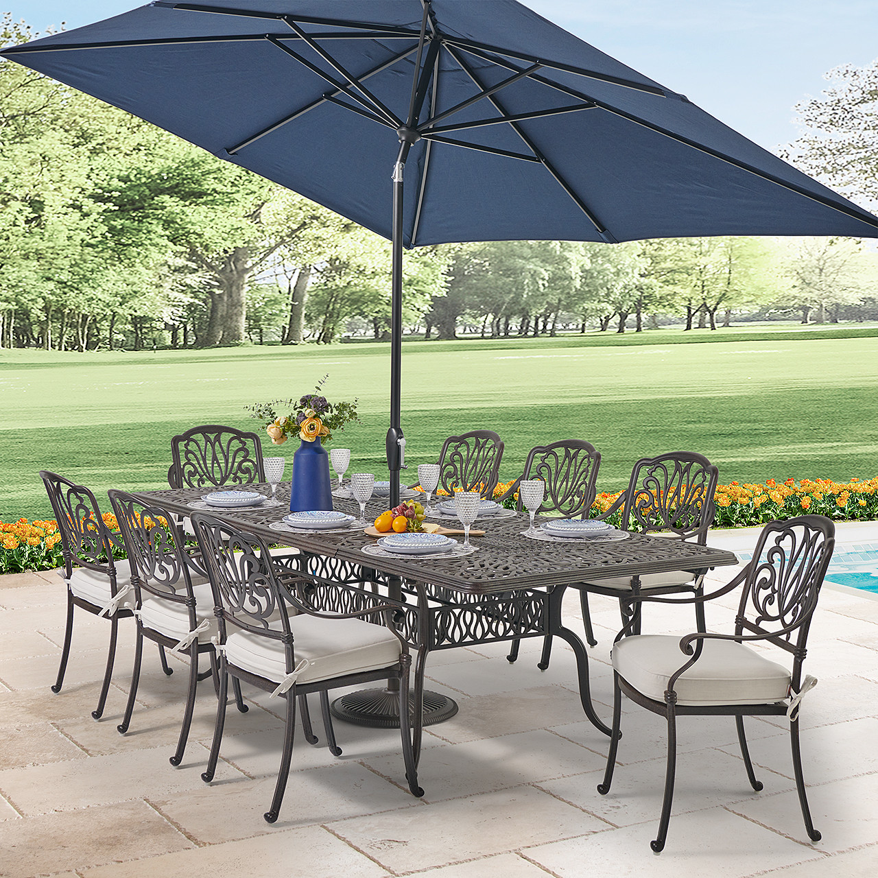Cadiz Aged Bronze Cast Aluminum with Cushions 9 Piece Dining Set + 71-103 x 44 in. Double Extension Table -