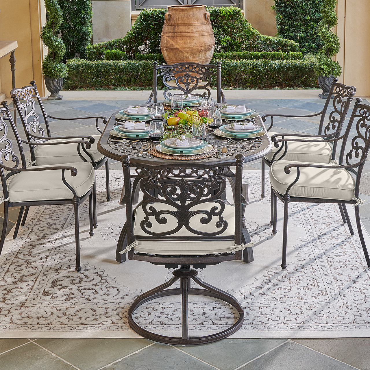 Milan Aged Bronze Cast Aluminum with Cushions 7 Piece Swivel Combo Dining Set + 72 x 42 in. Table