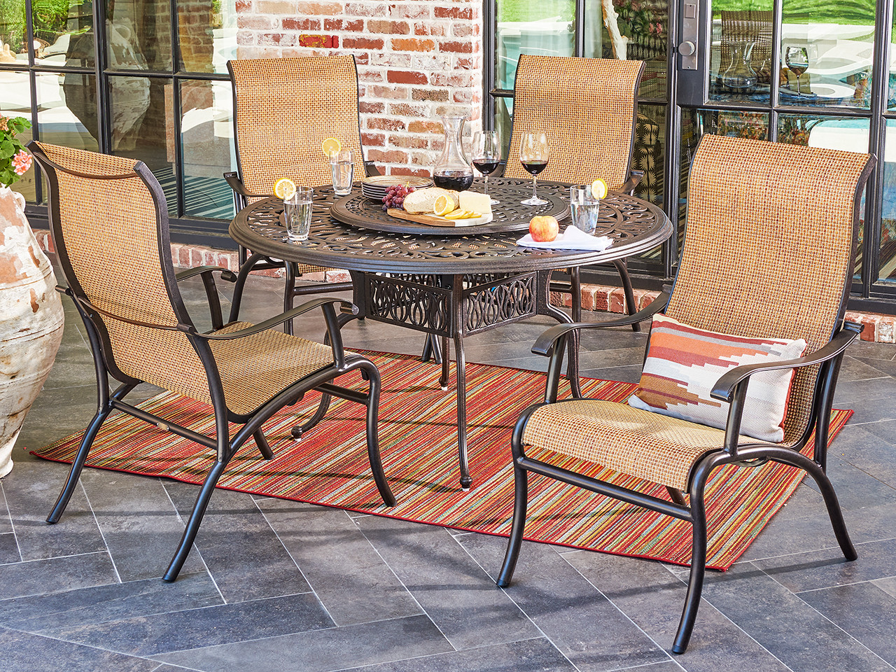 Scarsdale Autumn Rust Aluminum and Wicker Cordoba Sling 5 Pc. Dining Set with Ultra-high Back Arm Chairs and 54 in. D Table