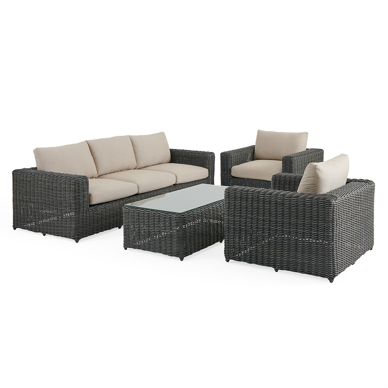 Outdoor wicker sofa group with cushions and coffee table.