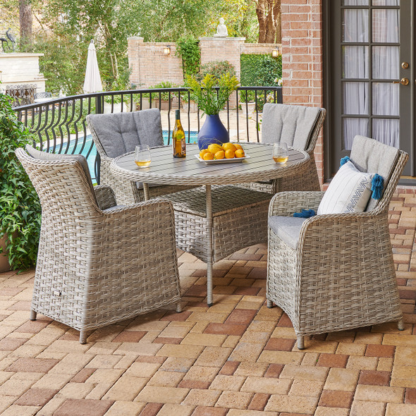 rattan garden table and six chairs