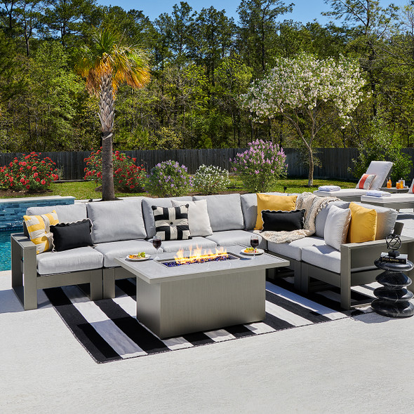 Montauk Slate Grey Polymer with Cushions 8 Piece Modular Sectional + 52 x 32 in. Sintered Fire Pit Table