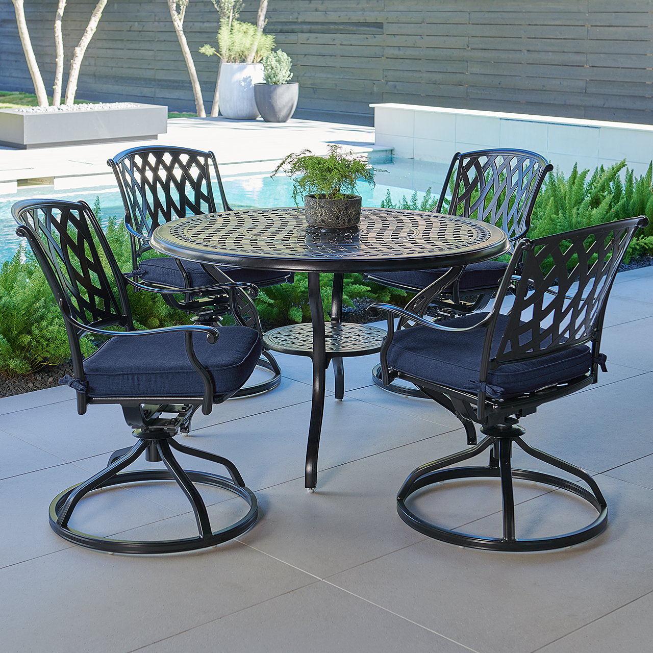 Tivoli Matte Black Cast Aluminum with Cushions 5 Piece Swivel Dining Set + 48 in. D Table (Spectrum Indigo)