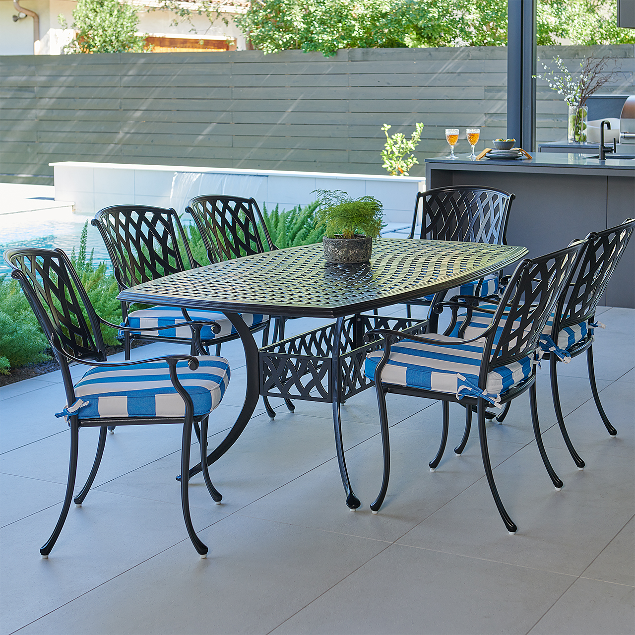Tivoli Matte Black Cast Aluminum with Cushions 7 Piece Dining Set + 72 x 42 in. Table (Cabana Regatta)