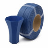 Matte dark blue 3D printer filament roll standing on edge with a matching dark blue 3D printed vase placed in front on a white background.