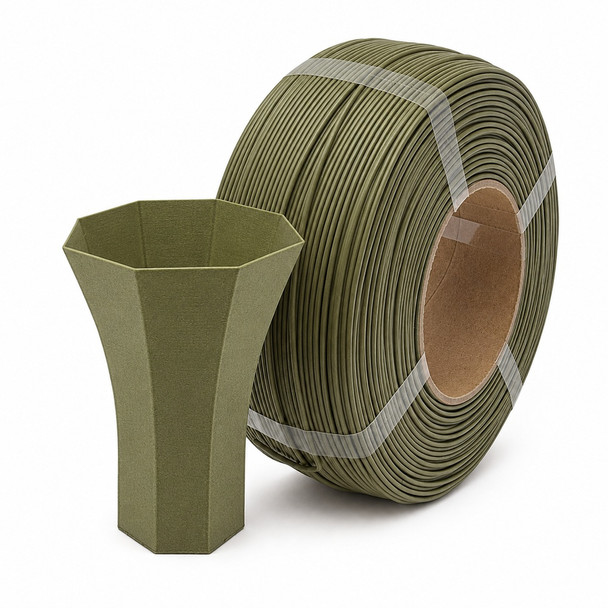 Matte green 3D printer filament roll standing on edge with a matching green 3D printed vase placed in front on a white background.