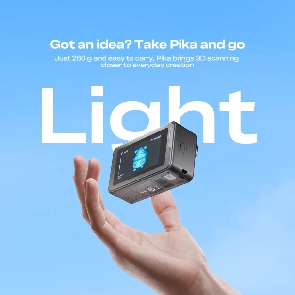 Creality Pika portable 3D scanner weighing 260 g and balanced above a hand