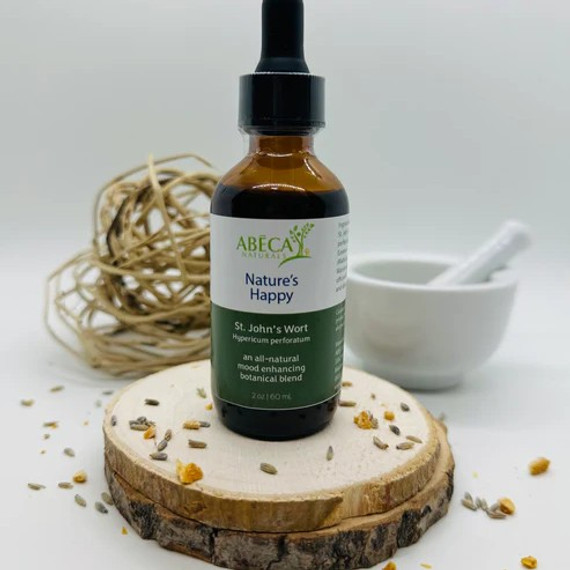Abeca Naturals Nature’s Happy 2 oz tincture bottle, mood-enhancing herbal blend with St. John’s Wort, Chamomile, Motherwort, and Marshmallow, displayed on a wooden slice with lavender buds, citrus peel, and natural decor. Abeca Naturals Nature’s Happy 2 oz tincture bottle, mood-enhancing herbal blend with St. John’s Wort, Chamomile, Motherwort, and Marshmallow, displayed on a wooden slice with lavender buds, citrus peel, and natural decor.
