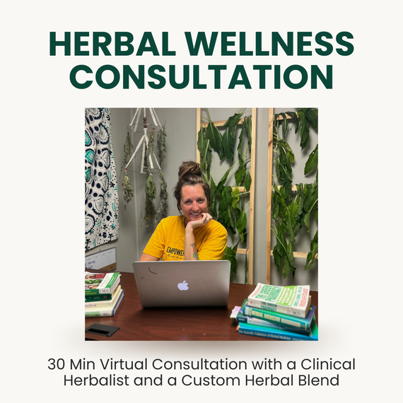 Clinical herbalist sitting at a desk with a laptop and herb books, plants drying in the background. Text on image reads ‘Herbal Wellness Consultation — 30-minute virtual consultation with a clinical herbalist and a custom herbal blend. Clinical herbalist sitting at a desk with a laptop and herb books, plants drying in the background. Text on image reads ‘Herbal Wellness Consultation — 30-minute virtual consultation with a clinical herbalist and a custom herbal blend.