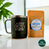 Humble Collective Digestive Ease Hemp Loose-Leaf Tea – Full Spectrum CBG-rich tea blend in kraft pouch with organic herbs, shown alongside a black mug that reads 'Life is an adventure, love is the key,' set on a white surface with natural light and greenery in the background.
