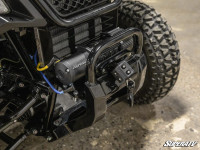 Honda Pioneer winch mount plate from Super ATV powder coated black installed on a Pioneer