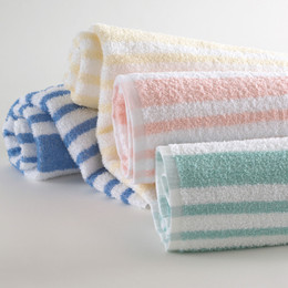 Tropical Stripe Pool Towels Rolled