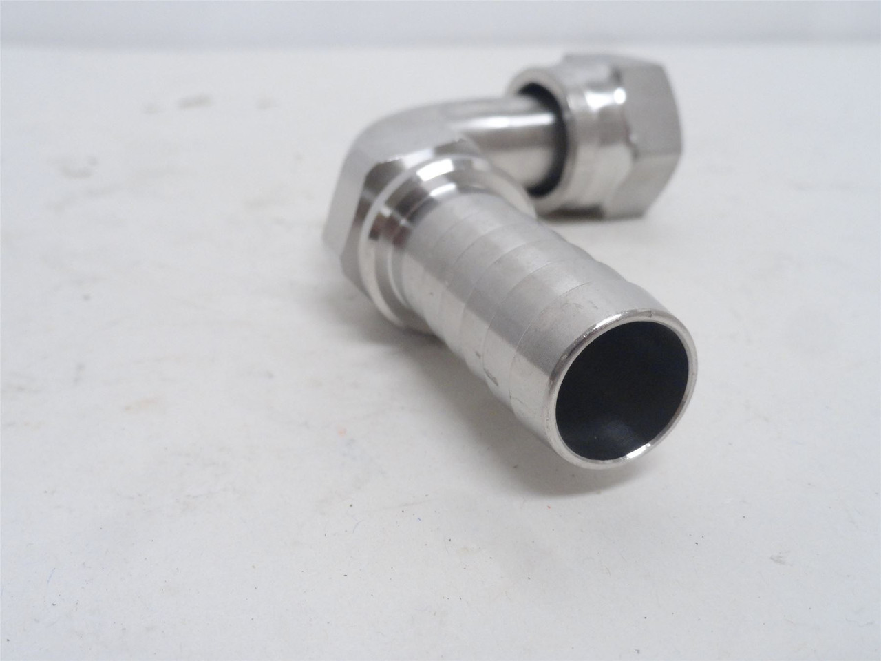 Gates 12B-12FJX90M-SS; Tube Elbow SS 90Deg 3/4JIC x 3/4 Barb