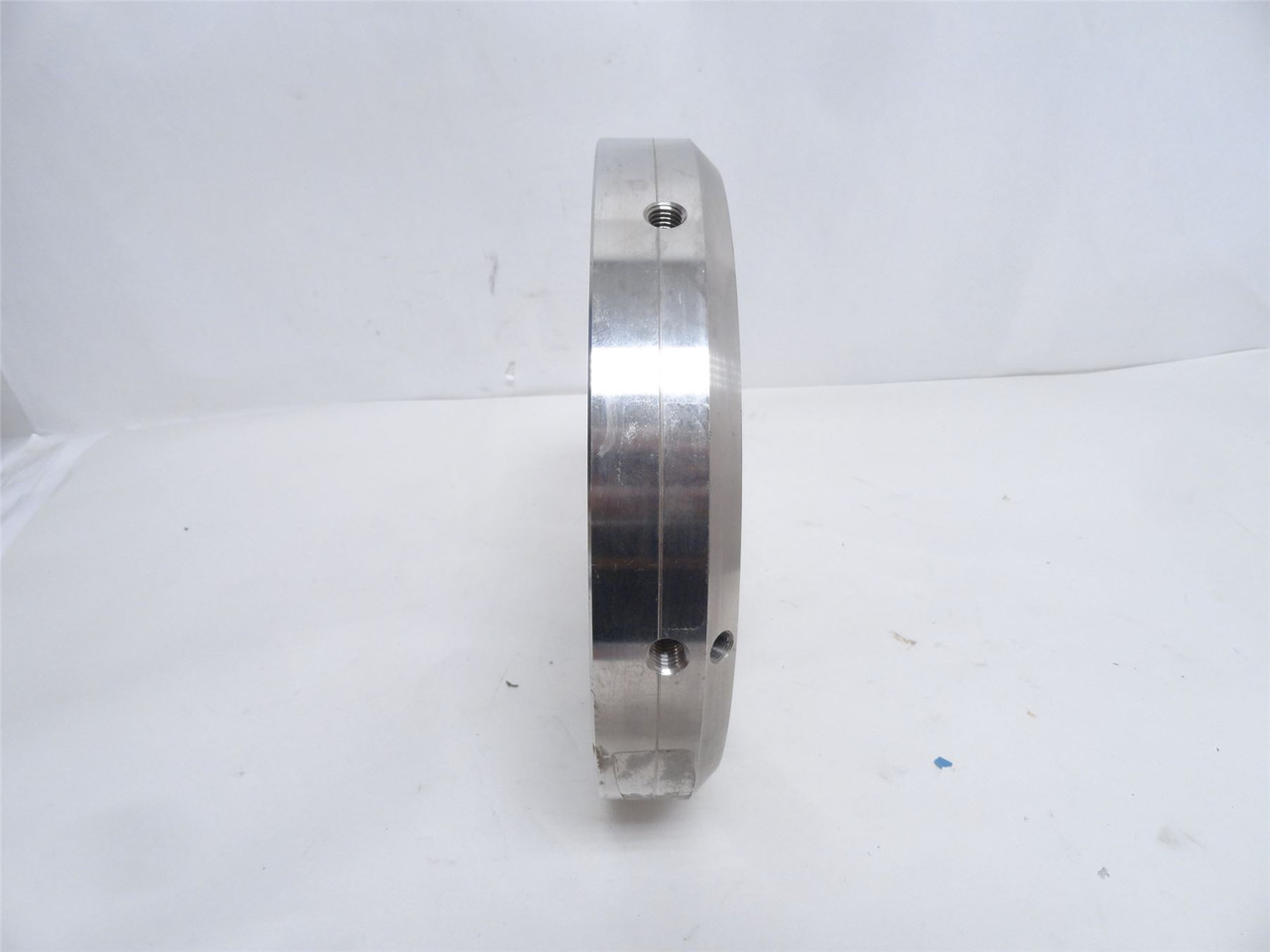 MFG- 9817506; Flange; SS; 10"OD x 3-1/8"ID x 1-11/16" Width
