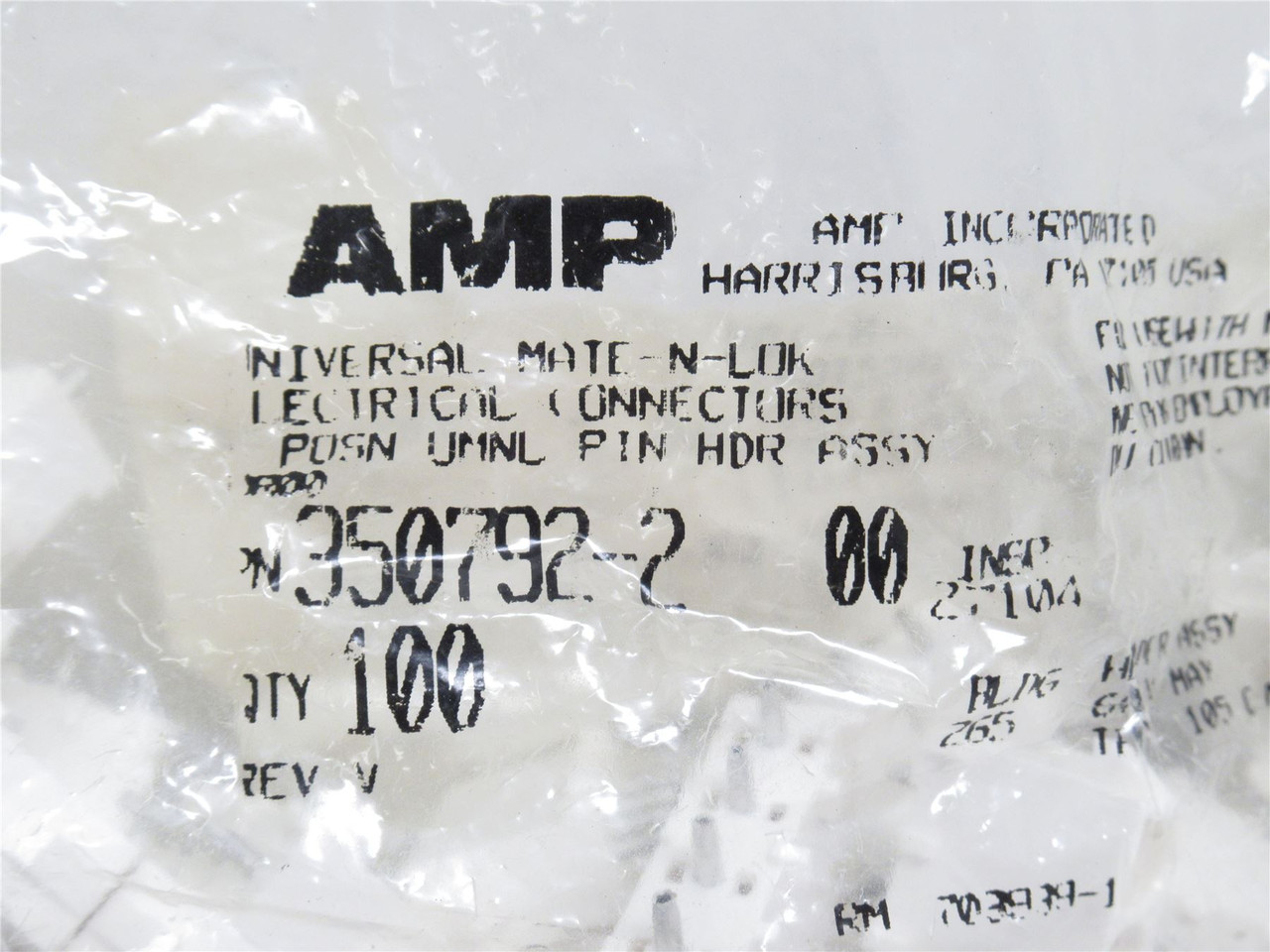 AMP 350792-2; Bag-100 Vertical Header Connector; 4-Pos; 6.3mm