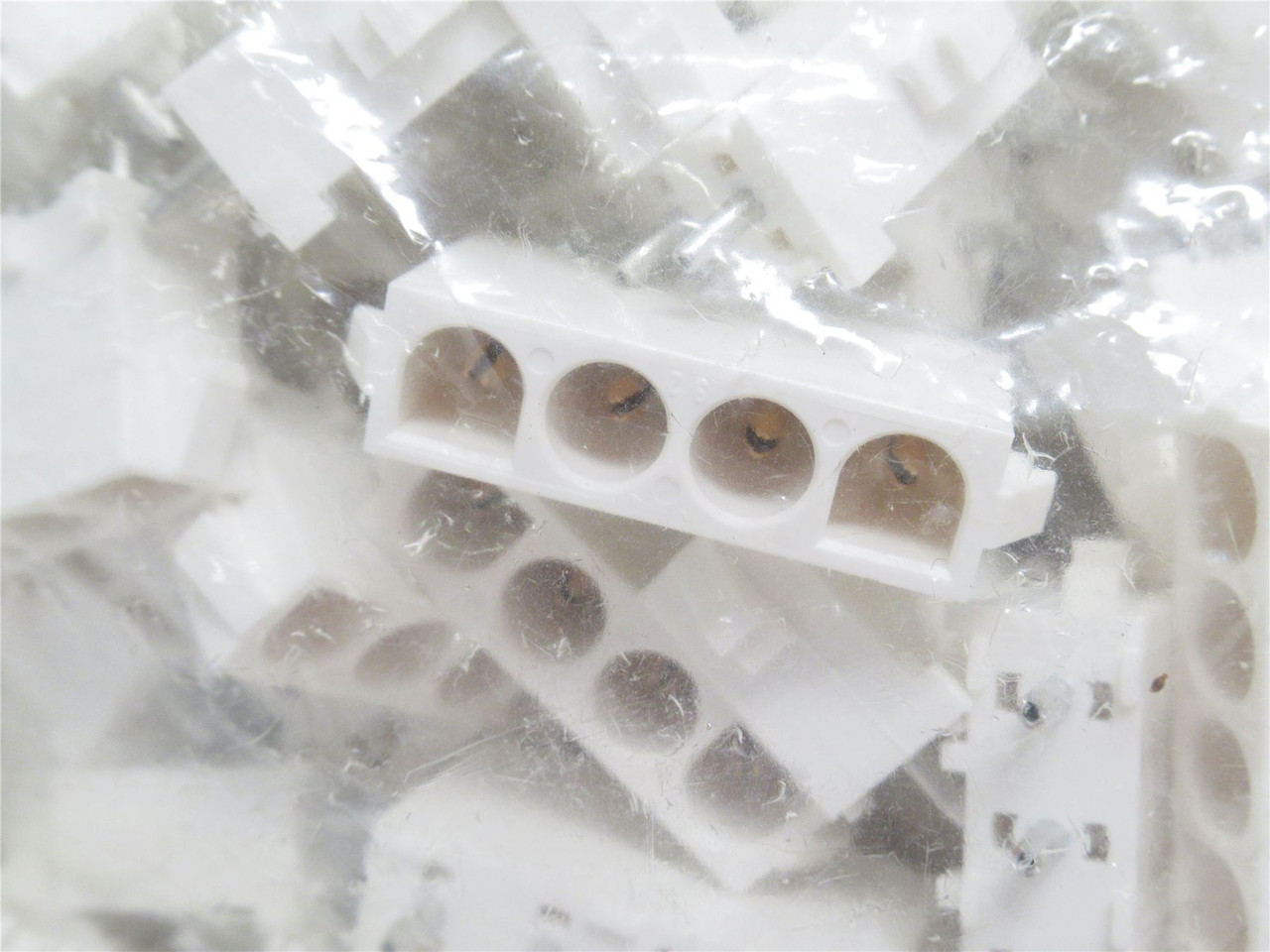 AMP 350792-2; Bag-100 Vertical Header Connector; 4-Pos; 6.3mm