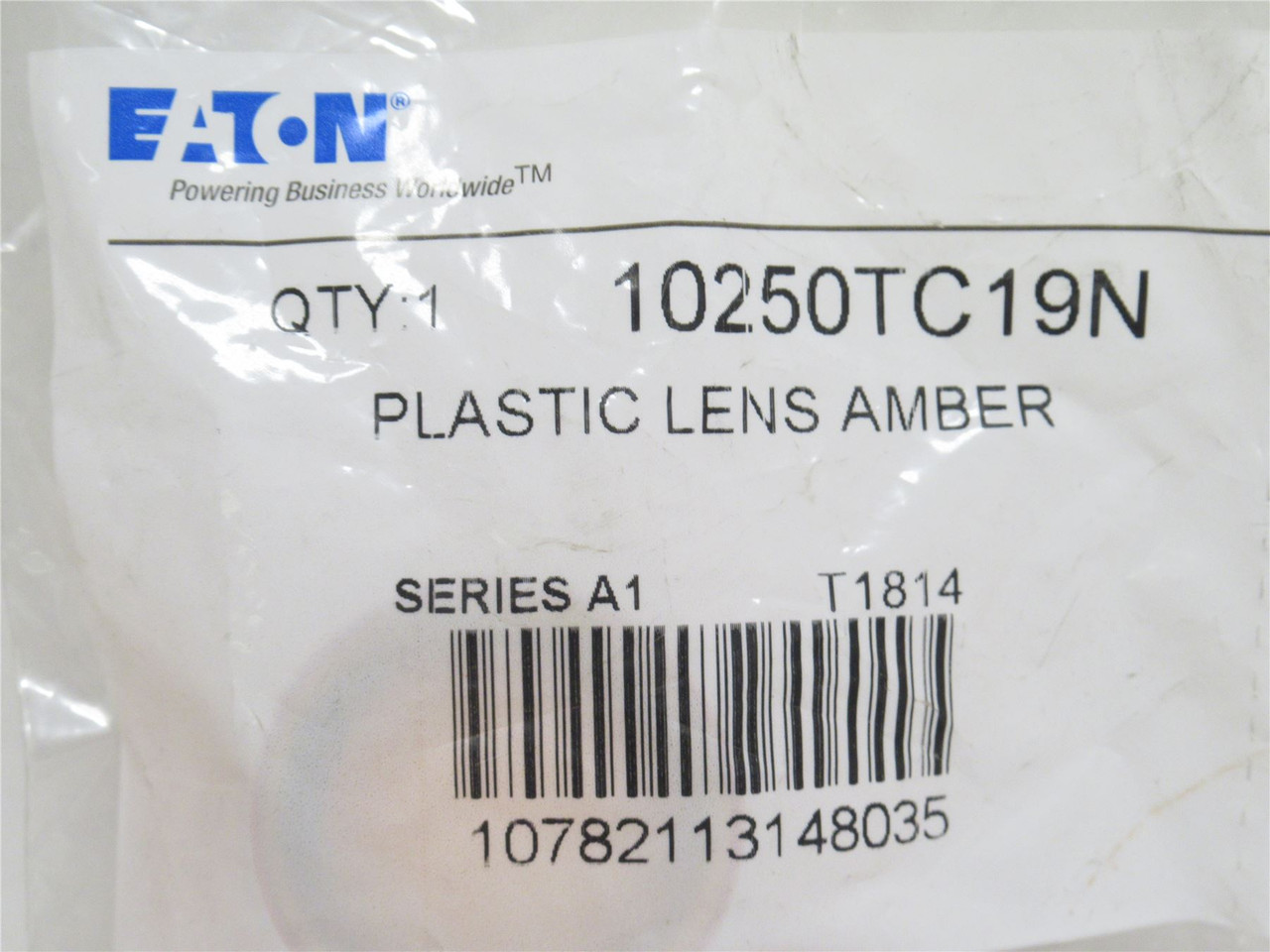 Eaton 10250TC19N; Amber Push-Button Lens