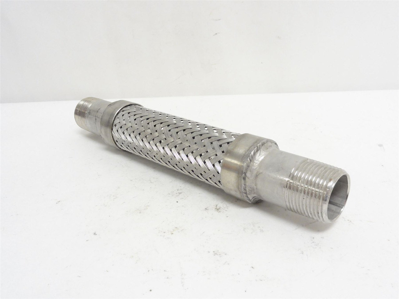 MFG- 91390282; Braided Flex Hose; SS; 1NPT; 10" Long
