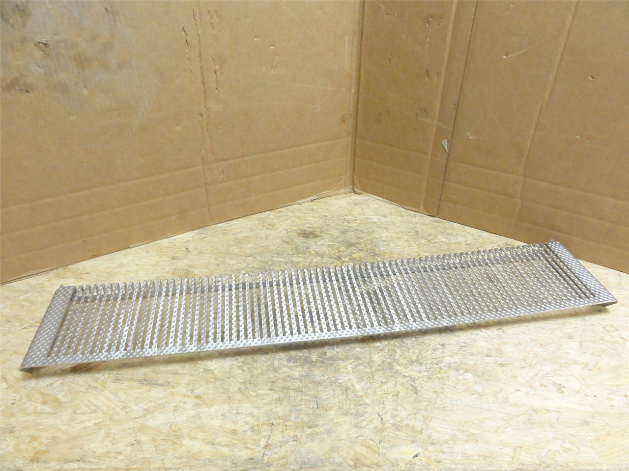 MFG- 1250035500; Slotted SS Long Chute; 39" Long x 7-1/8" Wide