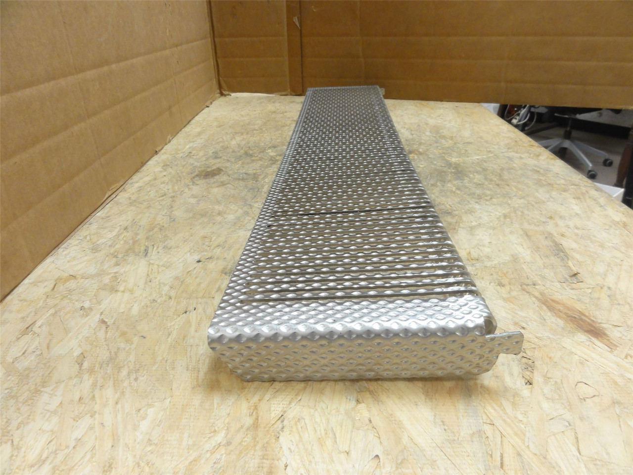 MFG- 1250035500; Slotted SS Long Chute; 39" Long x 7-1/8" Wide