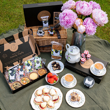 Luxury Sweet & Savoury Afternoon Tea Wicker Basket Hamper | Vegan, Gluten Free, Dairy Free, Eggless ORDER YOUR LUXURY SWEET & SAVOURY AFTERNOON TEA HAMPER TODAY Our luxury hampers contain a selection of delicious sweet and savoury treats which we think will be make perfect gifts for any occasion. Choose from our decadent Afternoon Tea hamper (the perfect gift for those that love an excuse for an afternoon tea!); our signature blondie and brownie bites; our new sweet and savoury afternoon tea - perfect for sharing! THE PERFECT TREATS The perfect treat is our mouth-watering vegan and gluten free