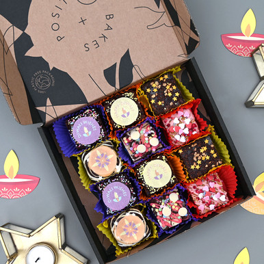 Diwali Celebration Brownie Selection Box Celebrate Diwali with Our Delicious Gluten-Free & Vegan Brownie Selection Box! Sweeten your Diwali celebrations with our Gluten-Free & Vegan Diwali Celebration Brownie Selection Box—a delightful assortment of handcrafted brownies and blondies, perfect for sharing with family and friends. Each brownie is adorned with festive Diwali-themed toppings, making them the ultimate treat for this joyous occasion! What's Inside Your Diwali Celebration Brownie Selection Box: Classic "Diwali Wishes" Brownie: