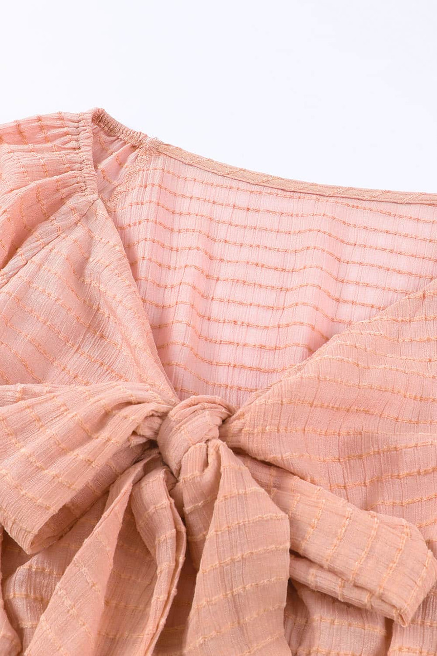 Pink Textured Tie Front Peplum Blouse