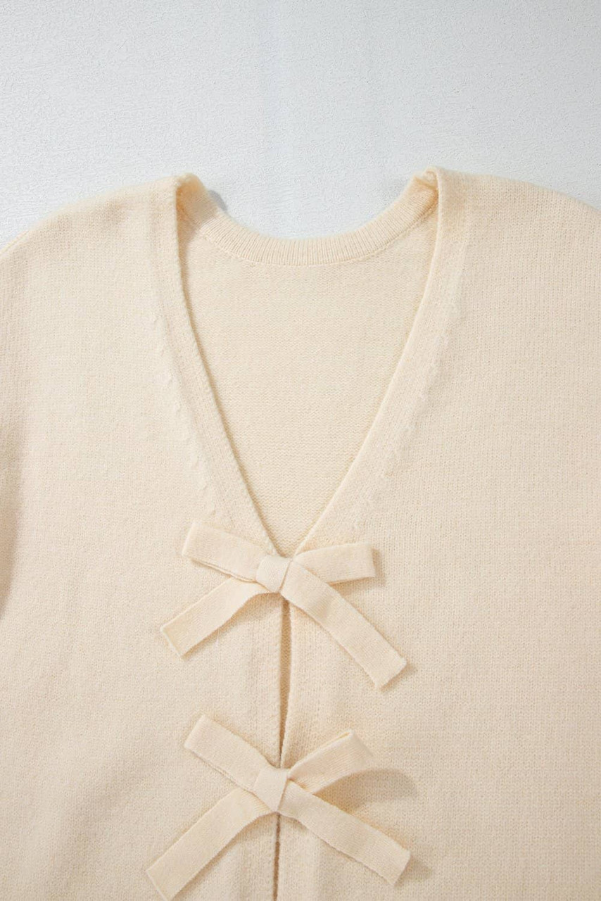 Jet Stream Bowknot Front Loose V Neck Knitted Cardigan Jet Stream Bowknot Front Loose V Neck Knitted Cardigan