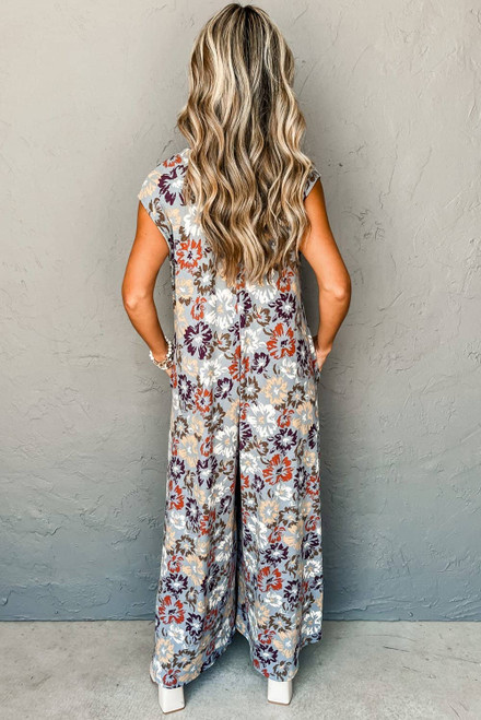Sky Blue Floral Sleeveless Buttoned Pocketed Wide Leg Jumpsuit Sky Blue Floral Sleeveless Buttoned Pocketed Wide Leg Jumpsuit