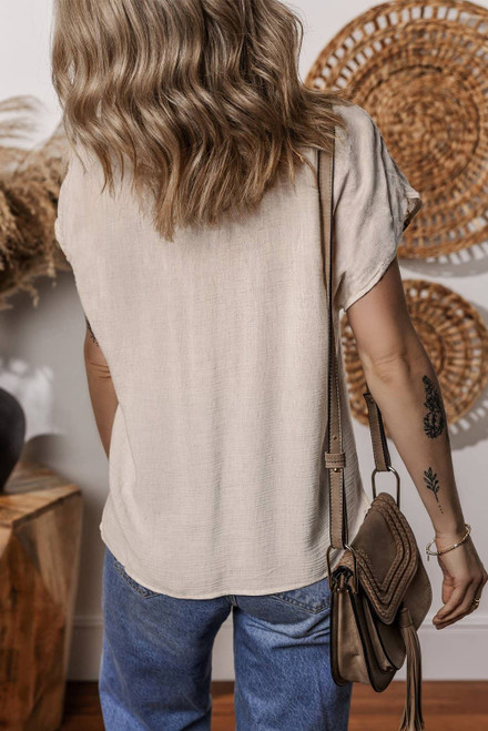 Jet Stream Geometric Embroidered Short Sleeve Tassel Tied V Neck Blouse