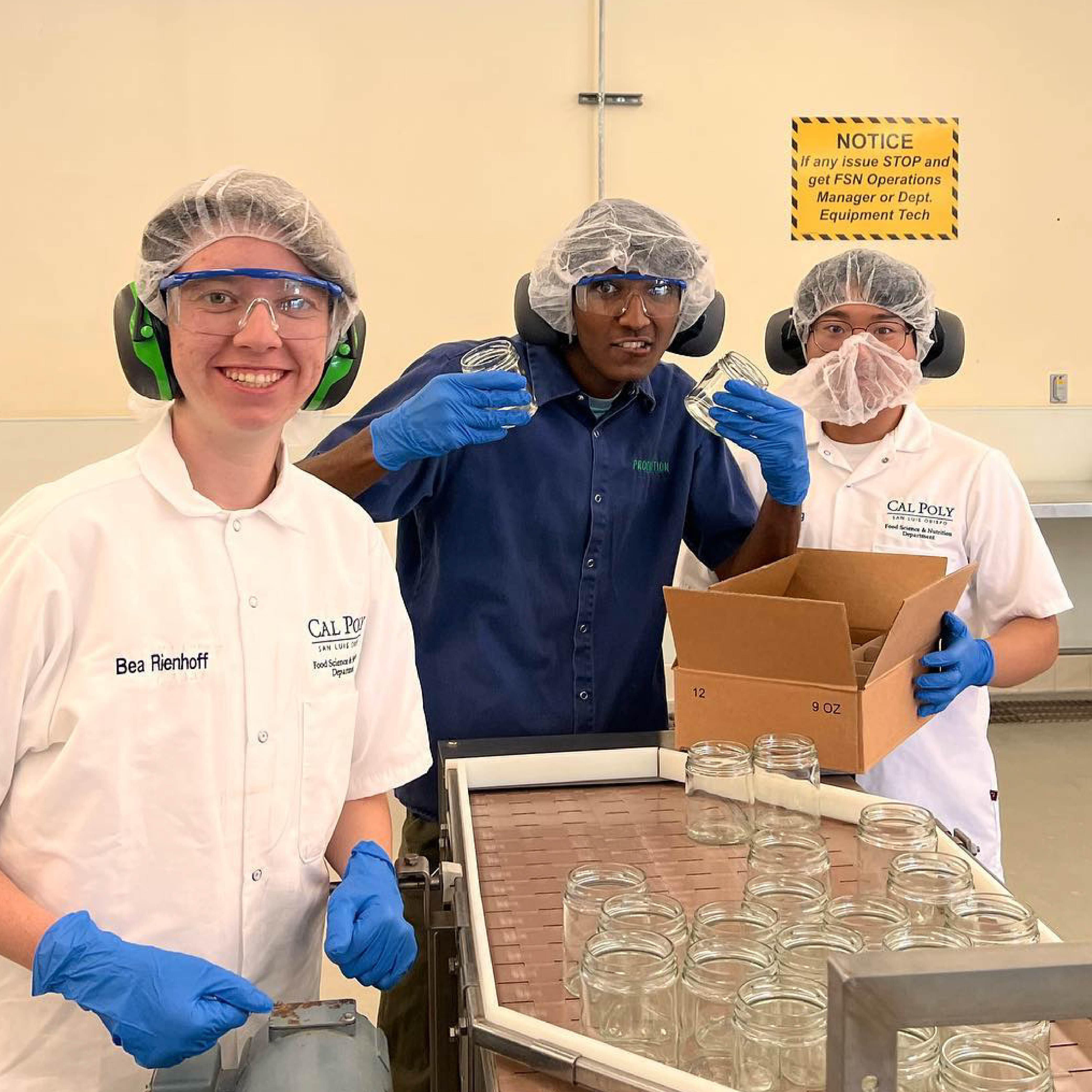 Cal Poly student employees working in the Food Science and Nutrition pilot plant