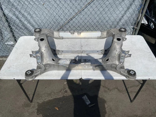 2012 - 2018 Tesla Model S X Used OEM Rear Subframe Crossmember 1009826-00-A used OEM rear subframe and crossmember