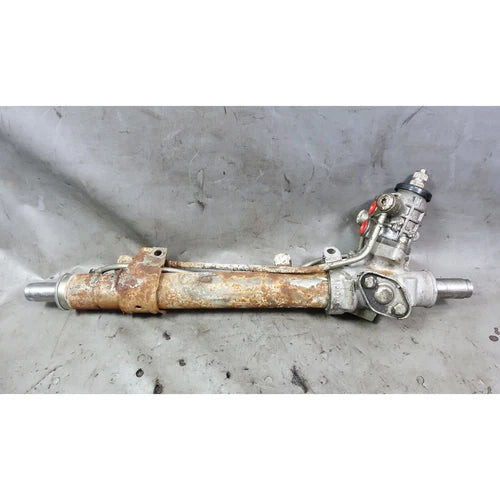 Damaged 1984-1987 BMW E30 318i 325e Factory Power Steering Rack and Pinion OEM used OEM rack and pinion