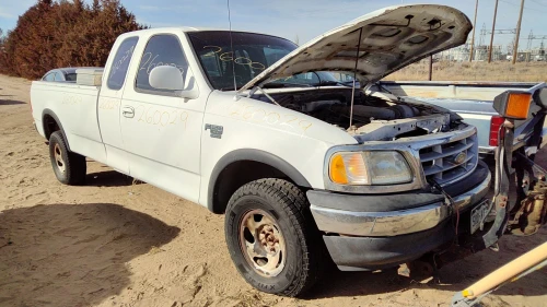 1997-1999 Ford F-150 F65Z9D653AA Used OEM EVAP Vapor Charcoal Canister