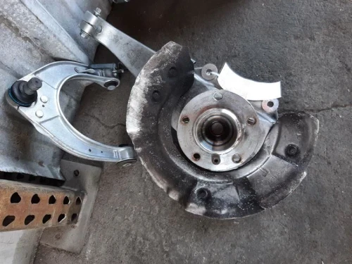 BMW 550i 31216775769 Front Left/Driver Used OEM Steering Knuckle Spindle
