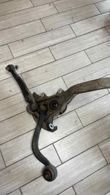 BMW X5 Front Left/Driver Used OEM Steering Knuckle Spindle