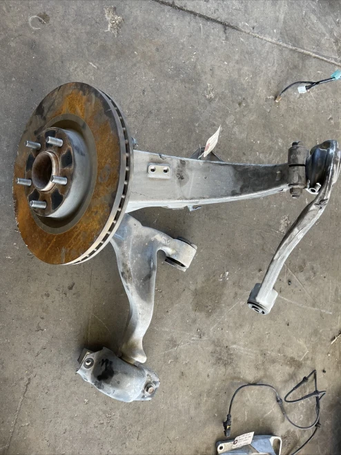 2006-2009 Infiniti M35 40015EG000 Left/Driver Used OEM Steering Knuckle Spindle