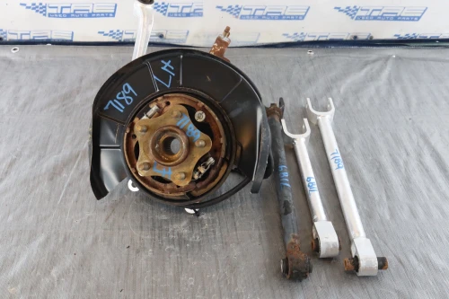2014-2022 Infiniti Q50 Rear Left/Driver Used OEM Steering Knuckle Spindle