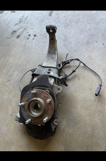 2007-2013 Infiniti G35 Front Right/Passenger RWD Used OEM Steering Knuckle Spindle