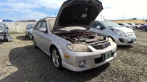 2001-2003 Mazda Protege 33195938 Front Right/Passenger ABS Used OEM Steering Knuckle Spindle