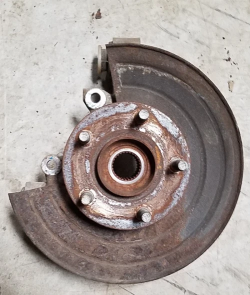 1989-1998 Mercury Cougar Rear Right/Passenger With Hub Disc Brake Used OEM Steering Knuckle Spindle
