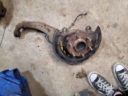 2005-2025 Nissan Frontier 1955257 Front Left/Driver Used OEM Steering Knuckle Spindle