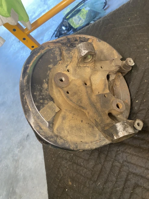 1987-1997 Nissan Front Left/Driver Used OEM Steering Knuckle Spindle