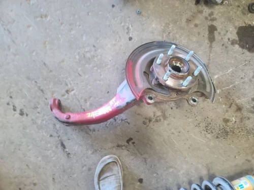 2005-2025 Nissan Frontier 1882417 Front Right/Passenger Used OEM Steering Knuckle Spindle