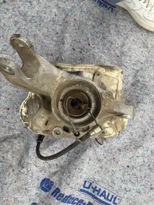 1995-1998 Porsche 911 Rear Left/Driver Used OEM Steering Knuckle Spindle