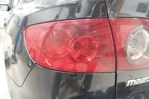 2004 2005 2006 Mazda 3 Sedan Driver LH Quarter Mounted Tail Light Lamp OEM used OEM tail light assembly