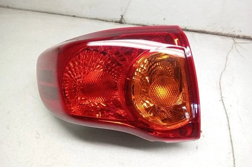 10 2010 Toyota Corolla Driver LH Quarter Mounted Tail Light Lamp OEM used OEM tail light assembly