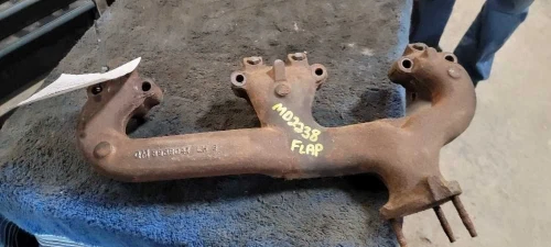 1973 Chevrolet Impala 5.7L Left 350 engine Used Exhaust Manifold