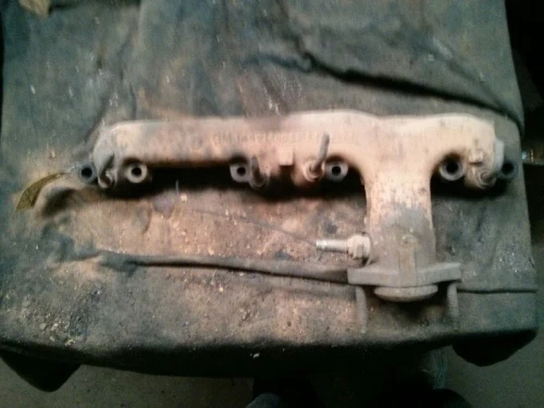 1980-1986 Chevrolet Caprice 5.0L Left 305 engine Used Exhaust Manifold