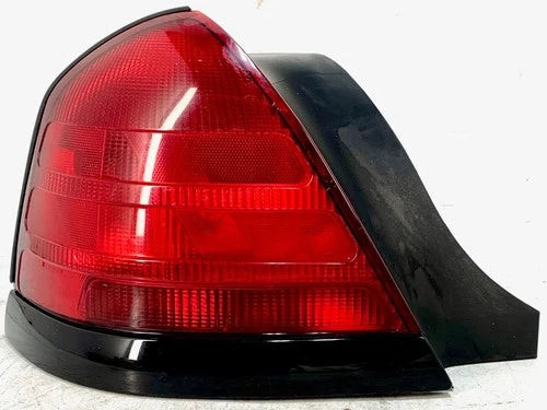200-2011 Ford Crown Victoria Driver LH Tail Light Quarter Mount Painted Trim OEM used OEM tail light assembly